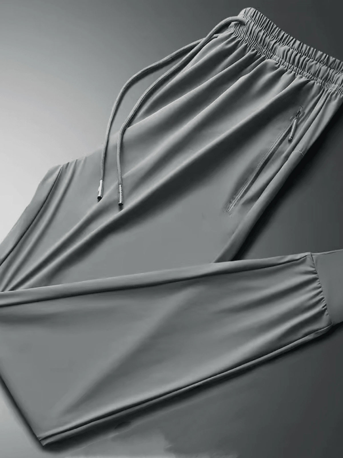 Kit 2 Calças Esportivas Jogger Flaneladas com Bolsos Laterais e Zíper - Preta e Cinza