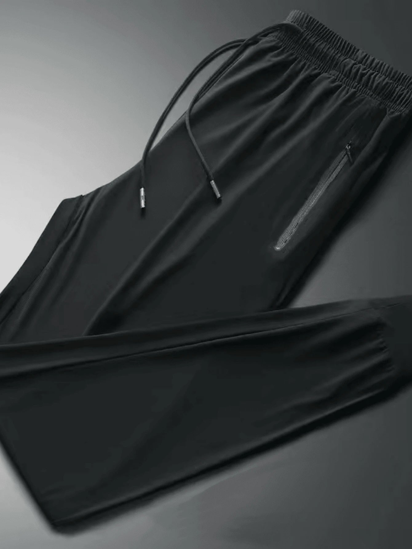 Kit 2 Calças Esportivas Jogger Flaneladas com Bolsos Laterais e Zíper - Preta e Cinza